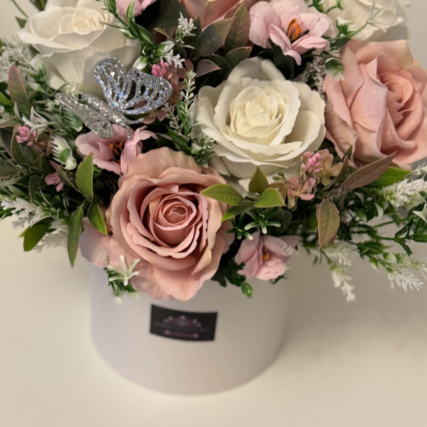 Luxury velvet touch white and vintage pink roses with foliage floral hat box arrangement