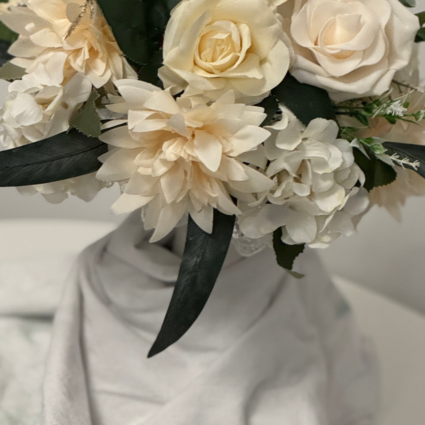 Artificial wedding ivory bridal bouquet with green leaves