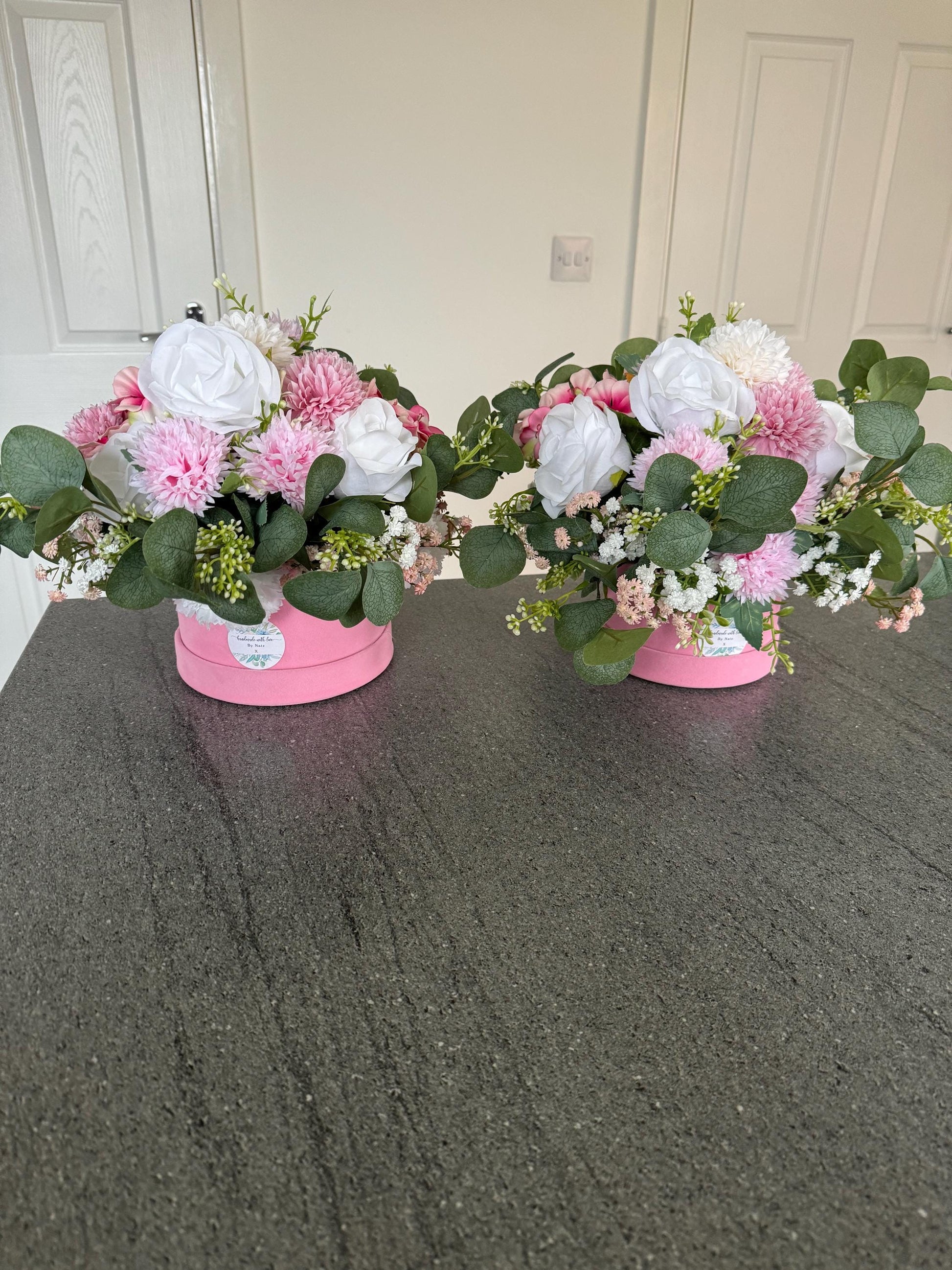 Luxury Pink suede hat box with artificial pink and white flowers with green leaves