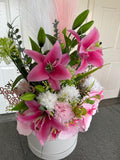 Luxury white hat box with artificial pink lilys