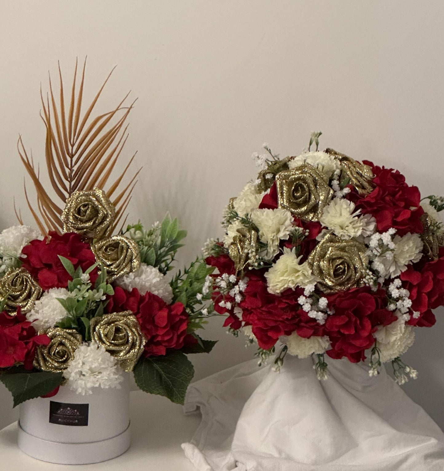 Luxury Valentines/Christmas white hat box with artificial red hydrangeas, gold glitter foam roses, ivory carnations and foliage