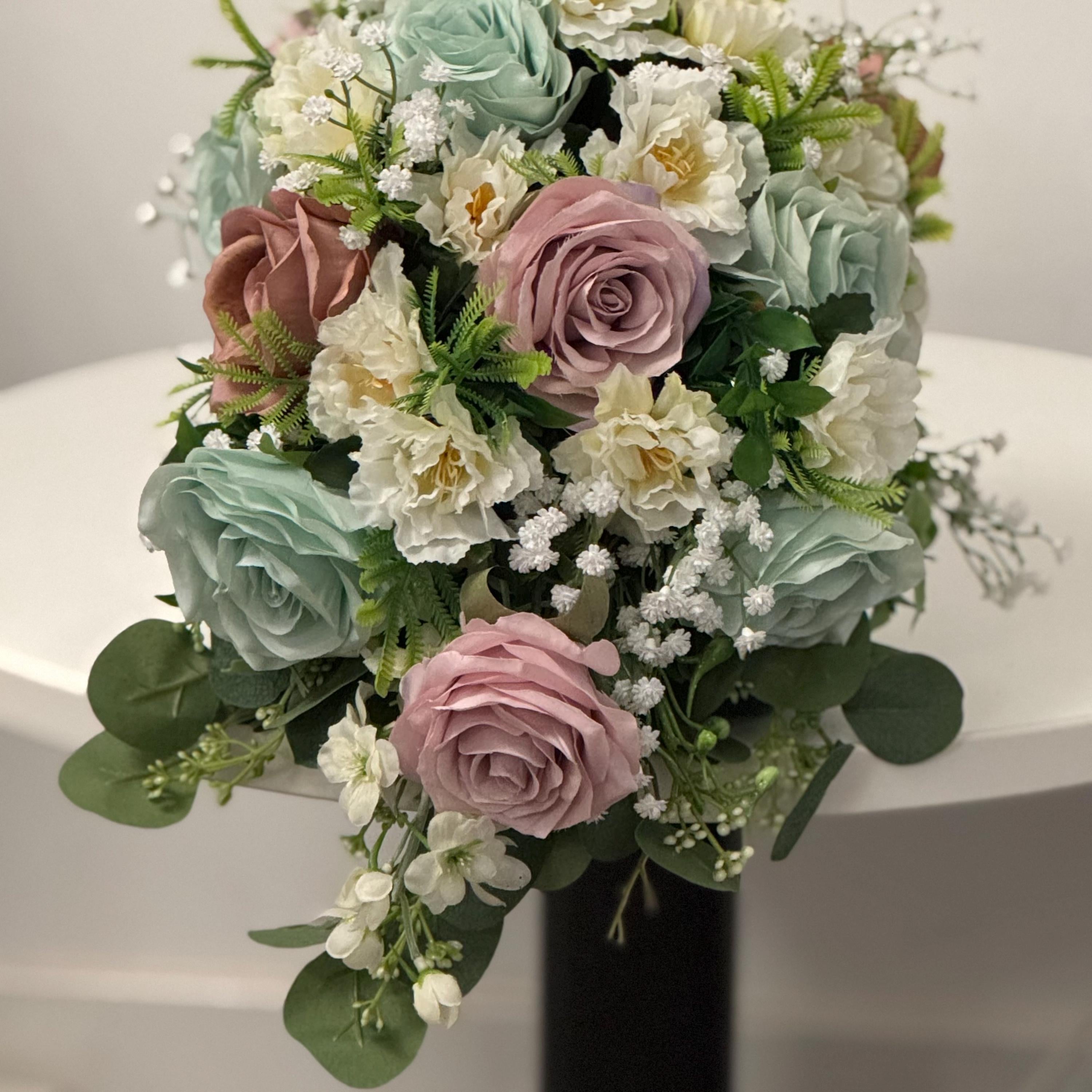 Artificial wedding bridal Teardrop bouquet with blush pink roses, sage green roses and ivory carnations with foliage