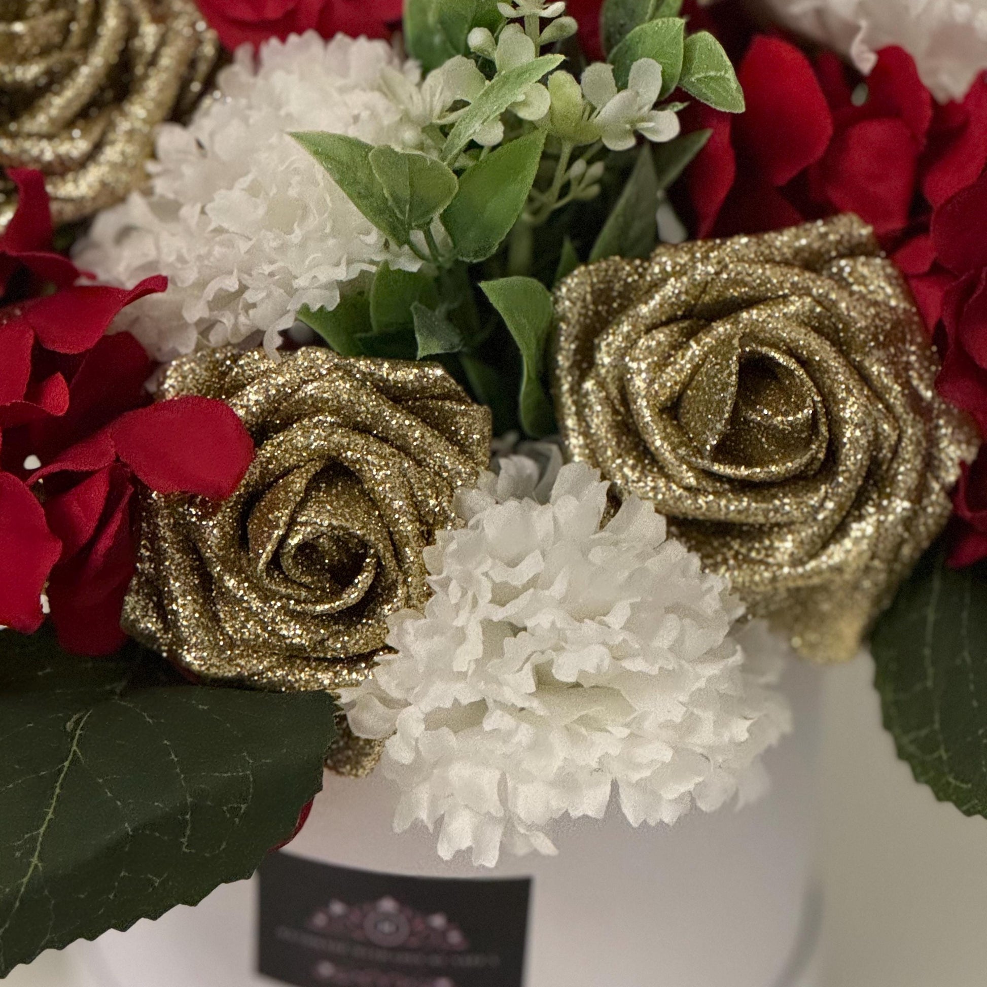 Luxury Valentines/Christmas white hat box with artificial red hydrangeas, gold glitter foam roses, ivory carnations and foliage