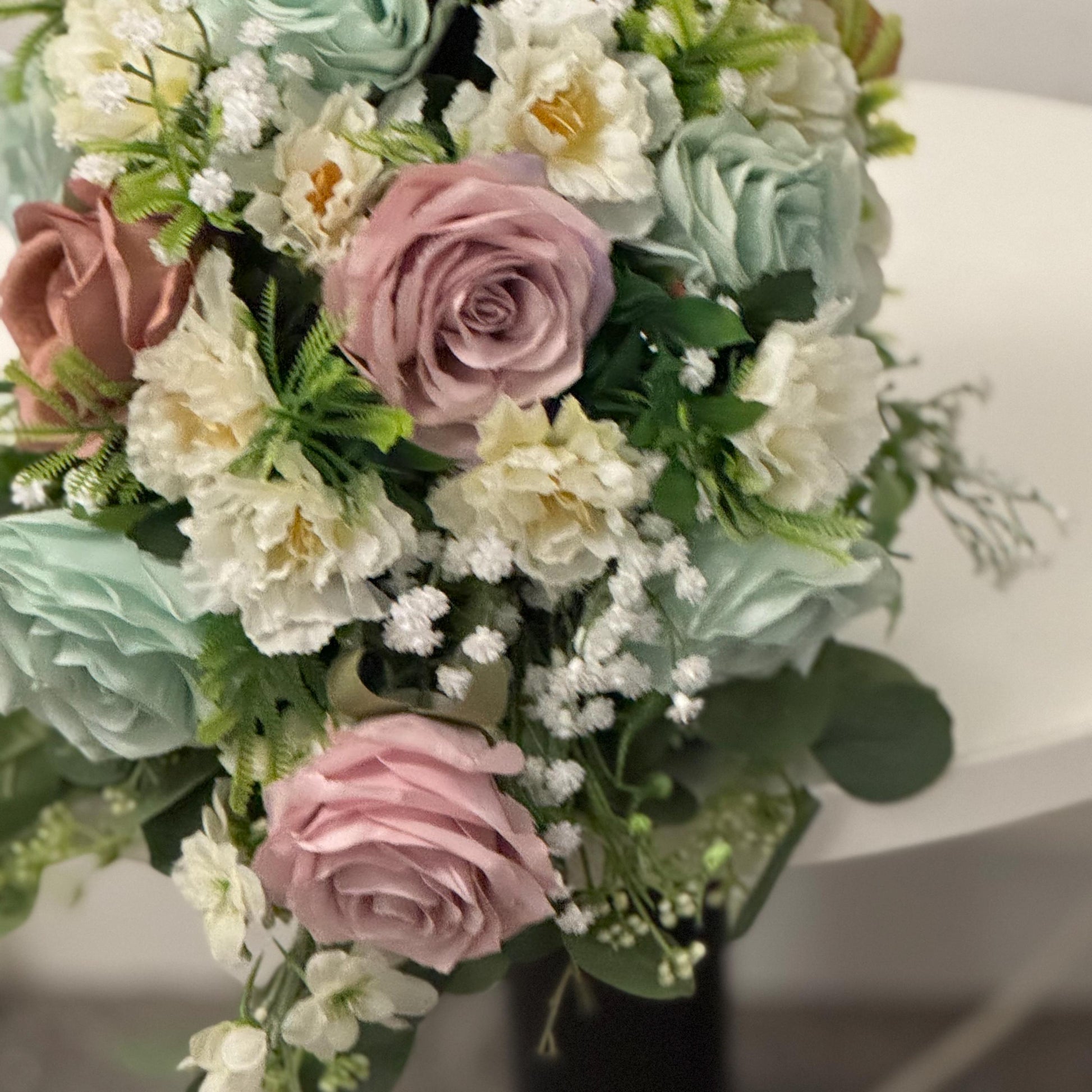 Artificial wedding bridal Teardrop bouquet with blush pink roses, sage green roses and ivory carnations with foliage