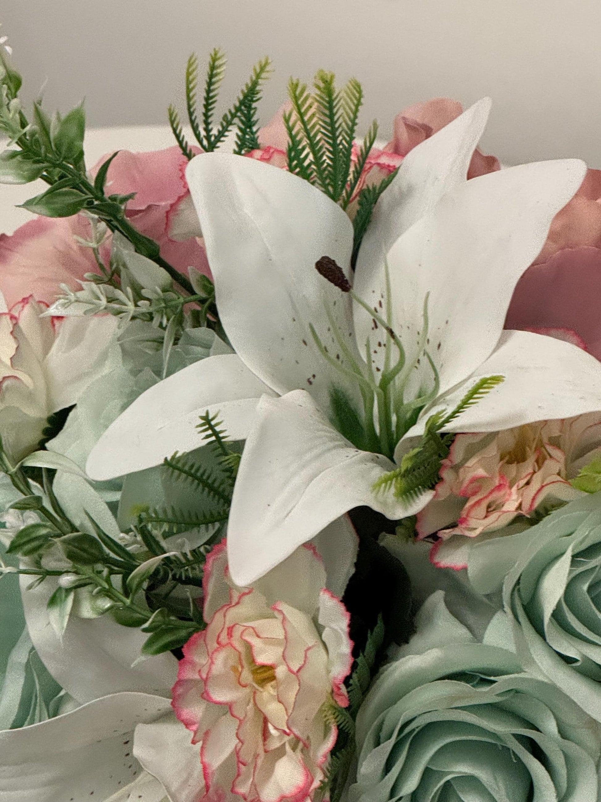 Artificial wedding bridal teardrop bouquet with blush pink hydrangeas , sage green roses and white Lilies with foliage