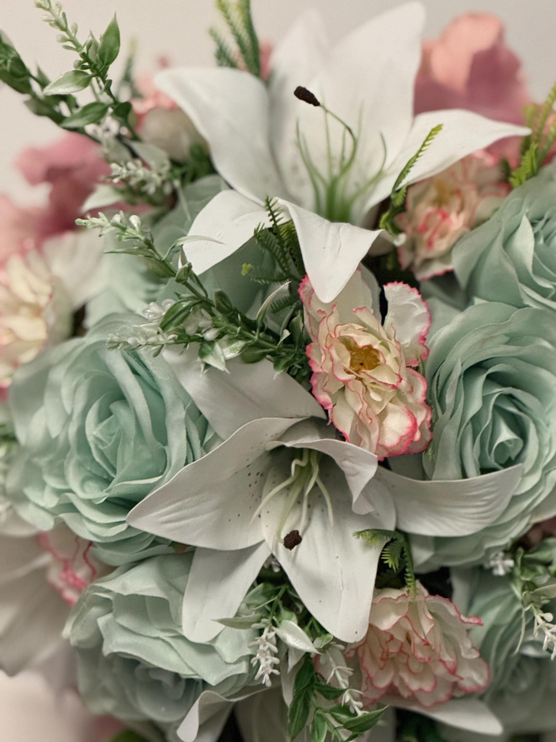 Artificial wedding bridal teardrop bouquet with blush pink hydrangeas , sage green roses and white Lilies with foliage