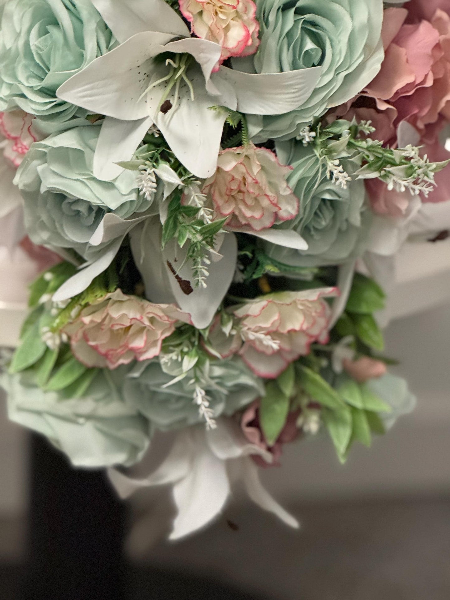 Artificial wedding bridal teardrop bouquet with blush pink hydrangeas , sage green roses and white Lilies with foliage