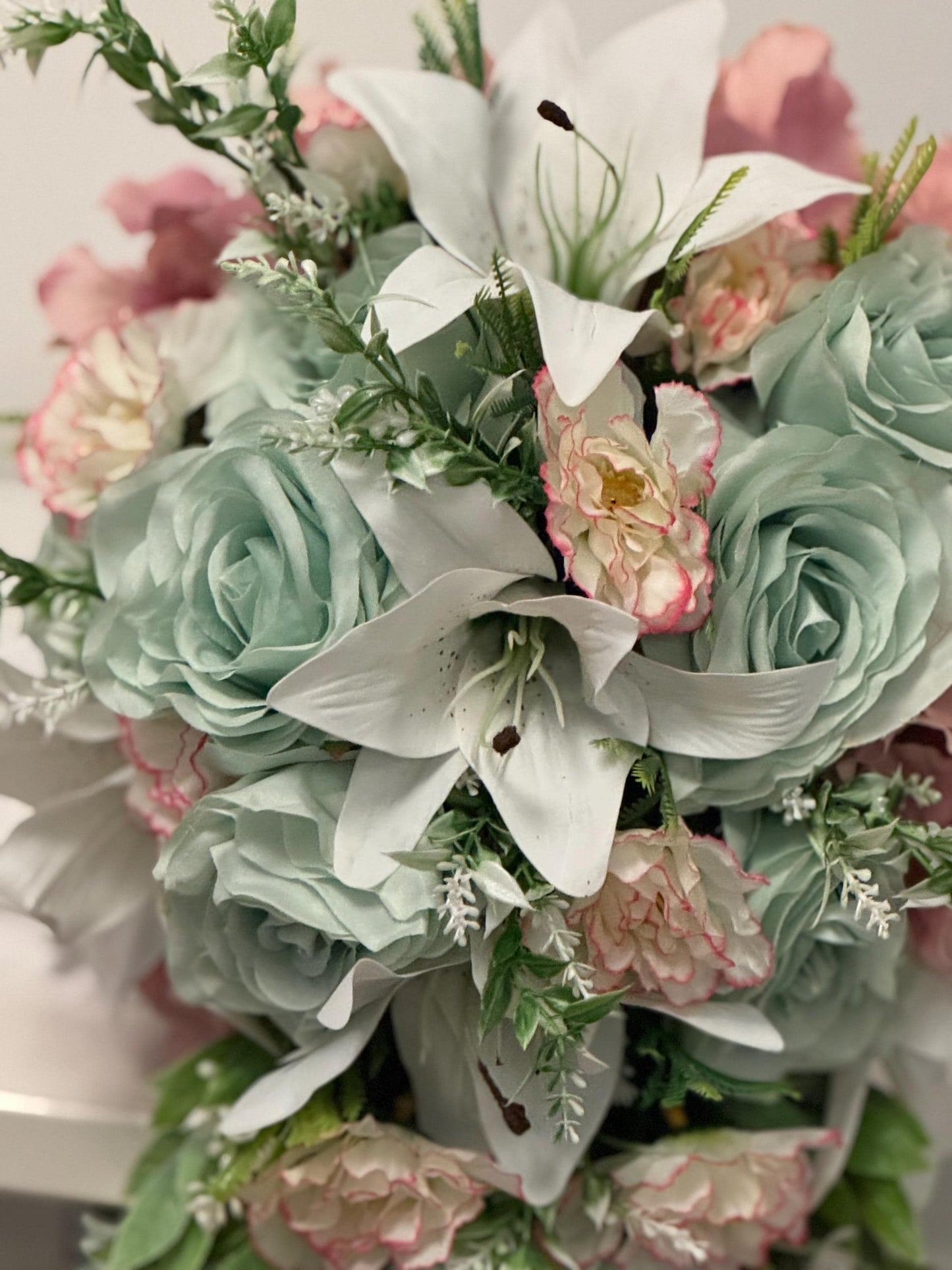 Artificial wedding bridal teardrop bouquet with blush pink hydrangeas , sage green roses and white Lilies with foliage