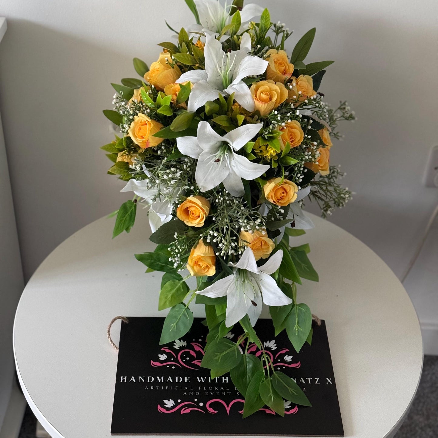 Artificial wedding bridal teardrop bouquet with white Lilys, yellow rosebuds and foliage. Ideal for spring/summer weddings