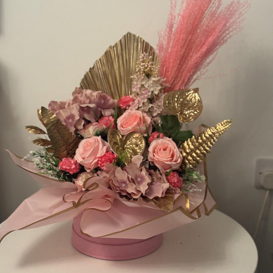 Luxury pink and gold artificial pink rose flower hat box.with green Foliage hatbox/ floral arrangement / ideal gift for Mother’s Day