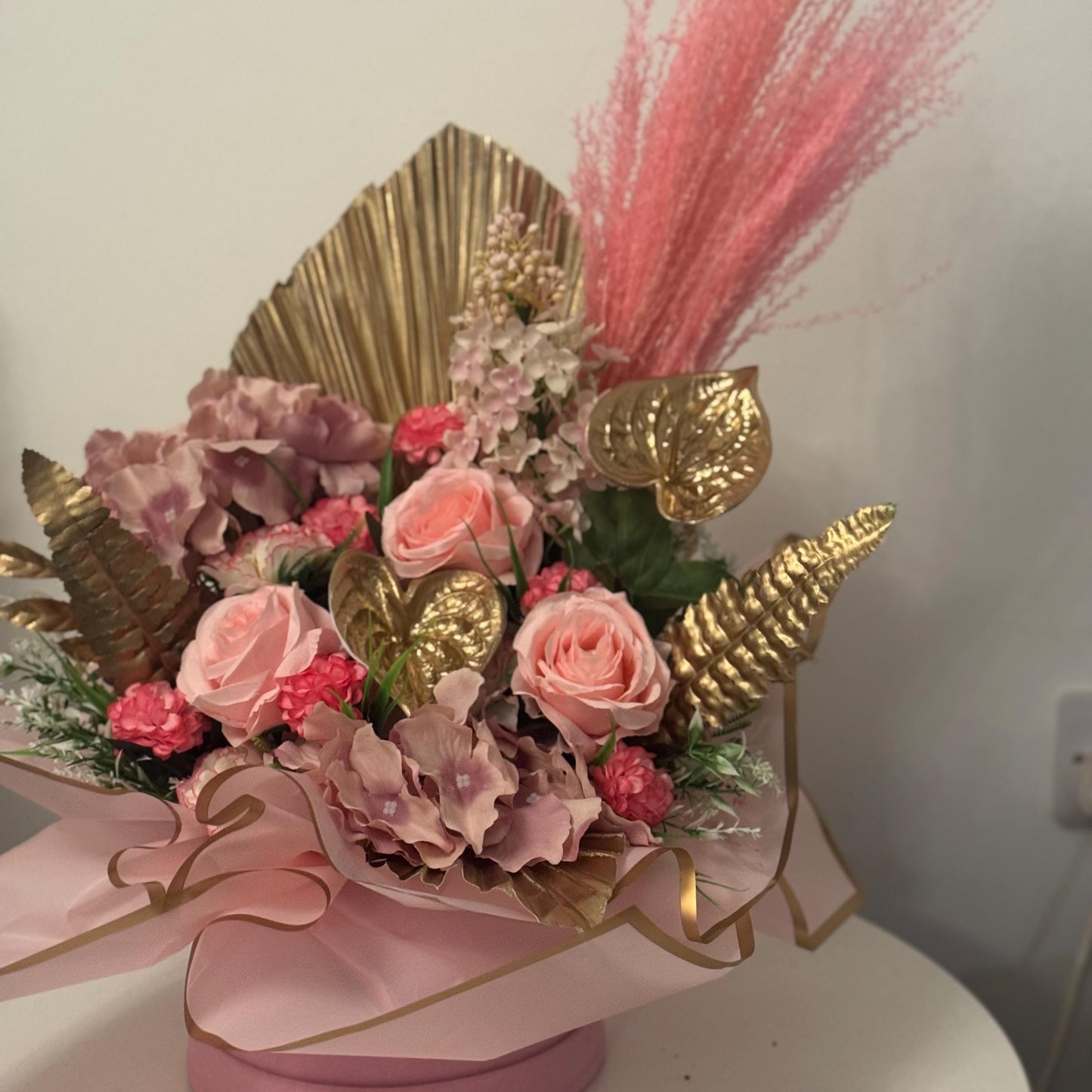 Luxury pink and gold artificial pink rose flower hat box.with green Foliage hatbox/ floral arrangement / ideal gift for Mother’s Day